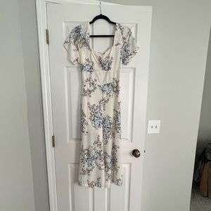 Beautiful white and blue floral jumpsuit. Wide leg cropped length